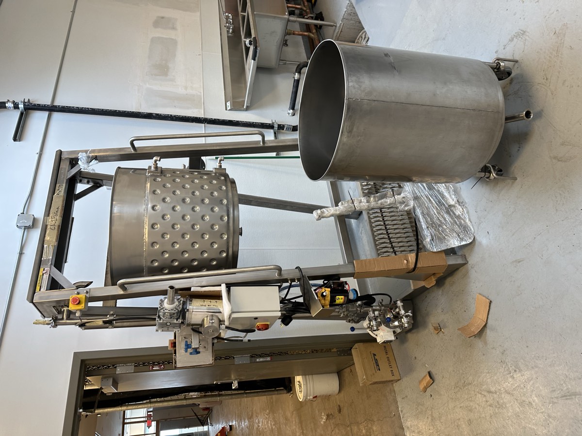 Steam-jacketed hash washing vessel on its lift frame